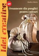 Link detalii carte „Ornamente din panglici pentru cadouri“.